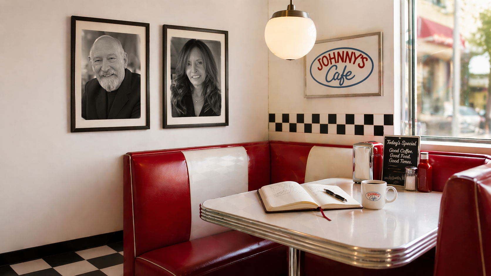 A quiet booth at Johnny's Cafe with portraits on the wall